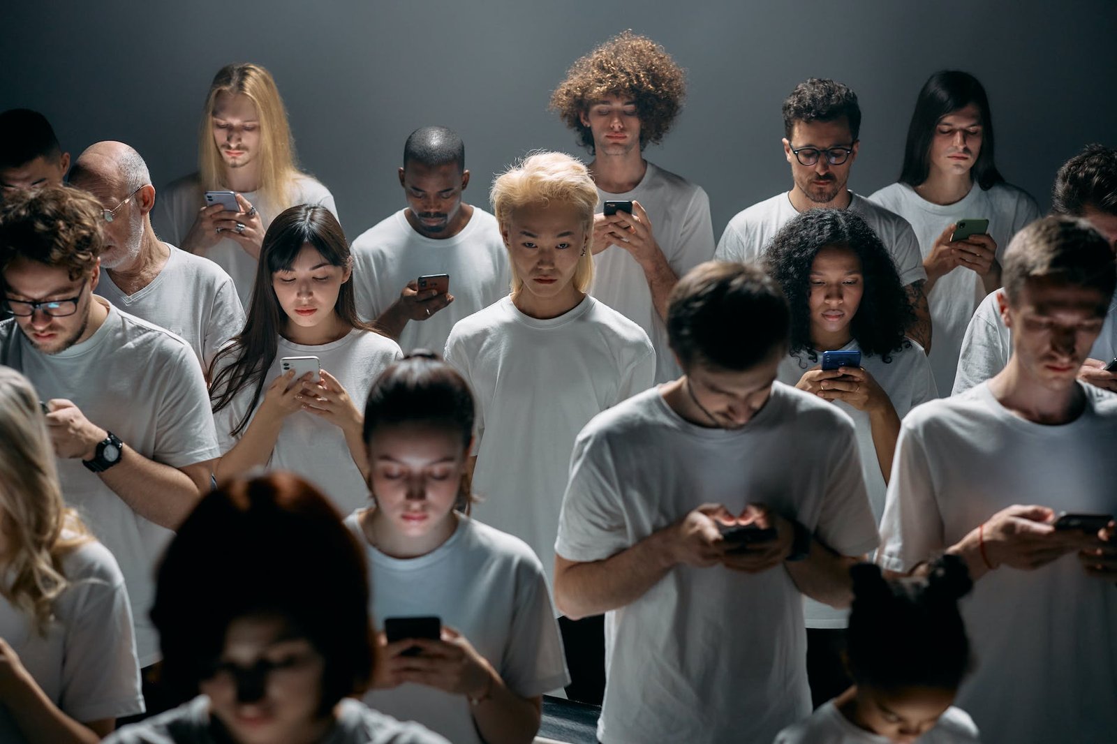 group of people in white shirts